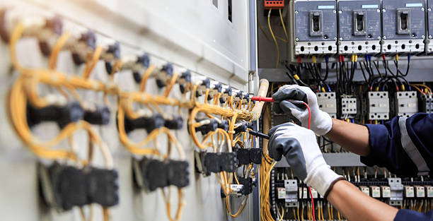 Professional Electrician technician working in Durham, OR